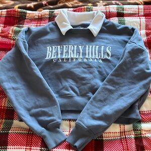 Women’s XS sweatshirt with false collar. Blue with white collar and embroidery.